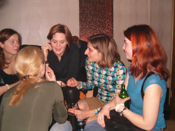 Milena talking with friends from her university.