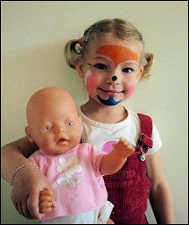 Fiona with a doll two months ago -- Luca's pictures are not online yet.